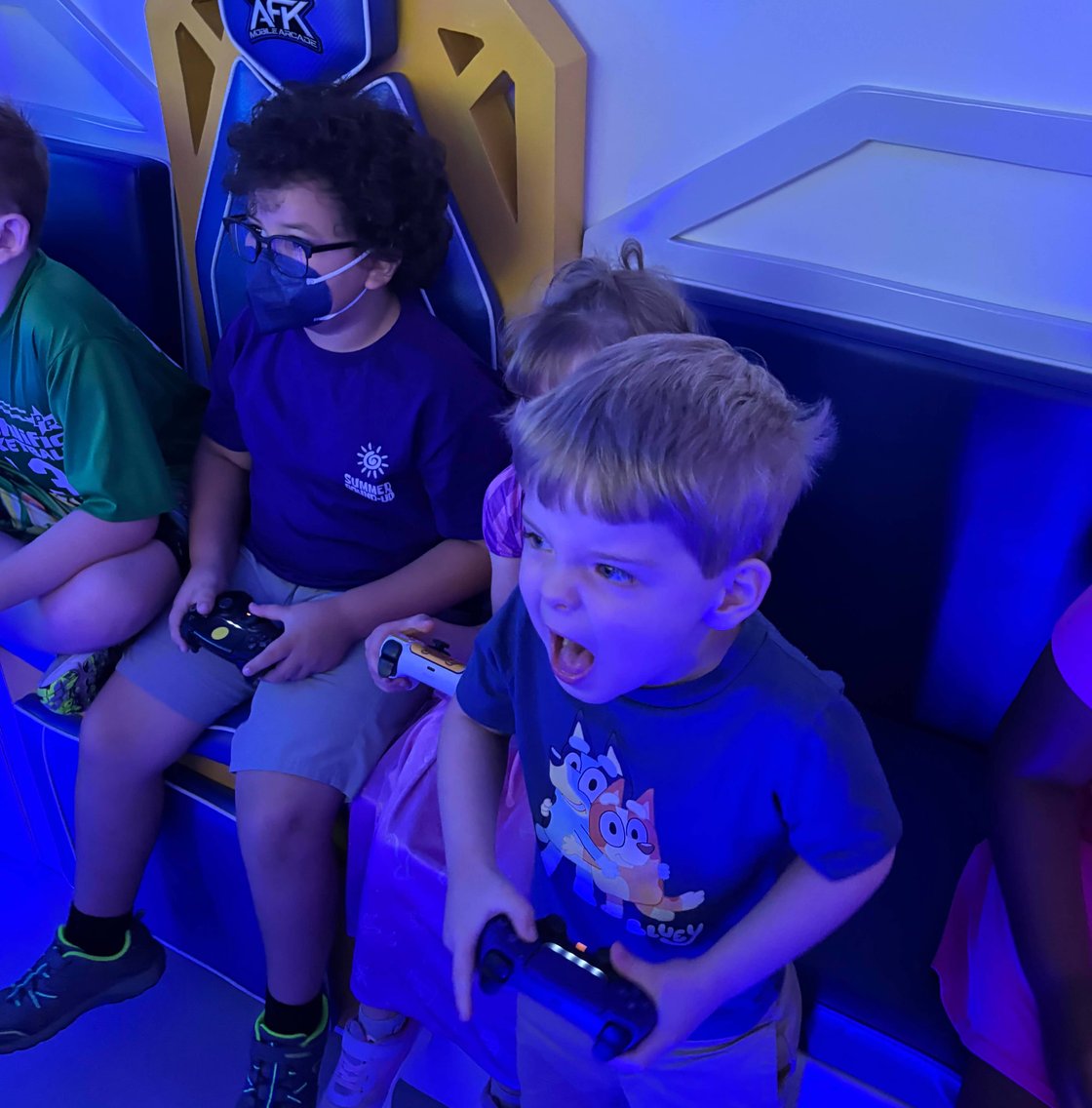 AFK Mobile Arcade gaming trailer at an outdoor event