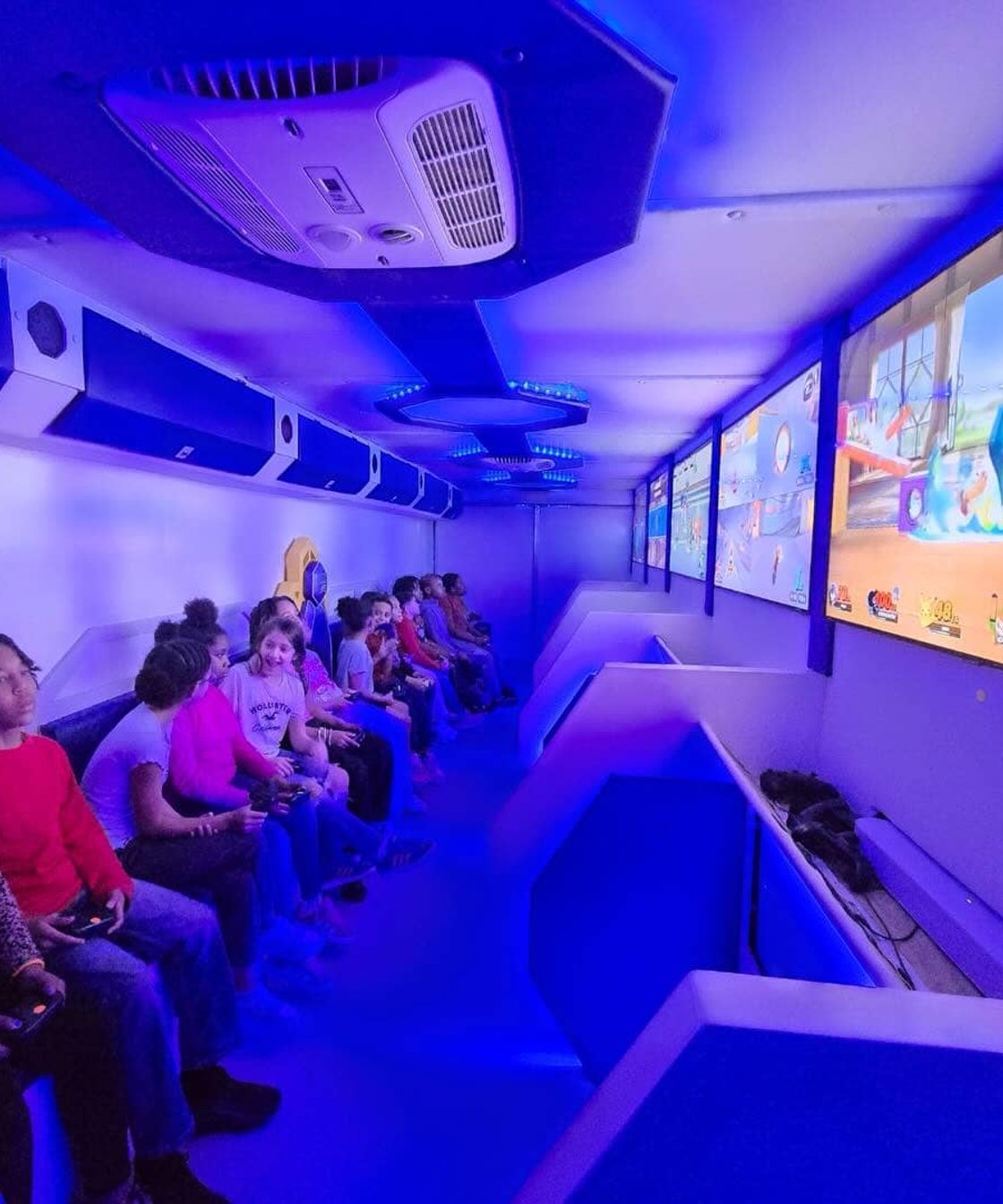 Mobile arcade trailer at an outdoor community event