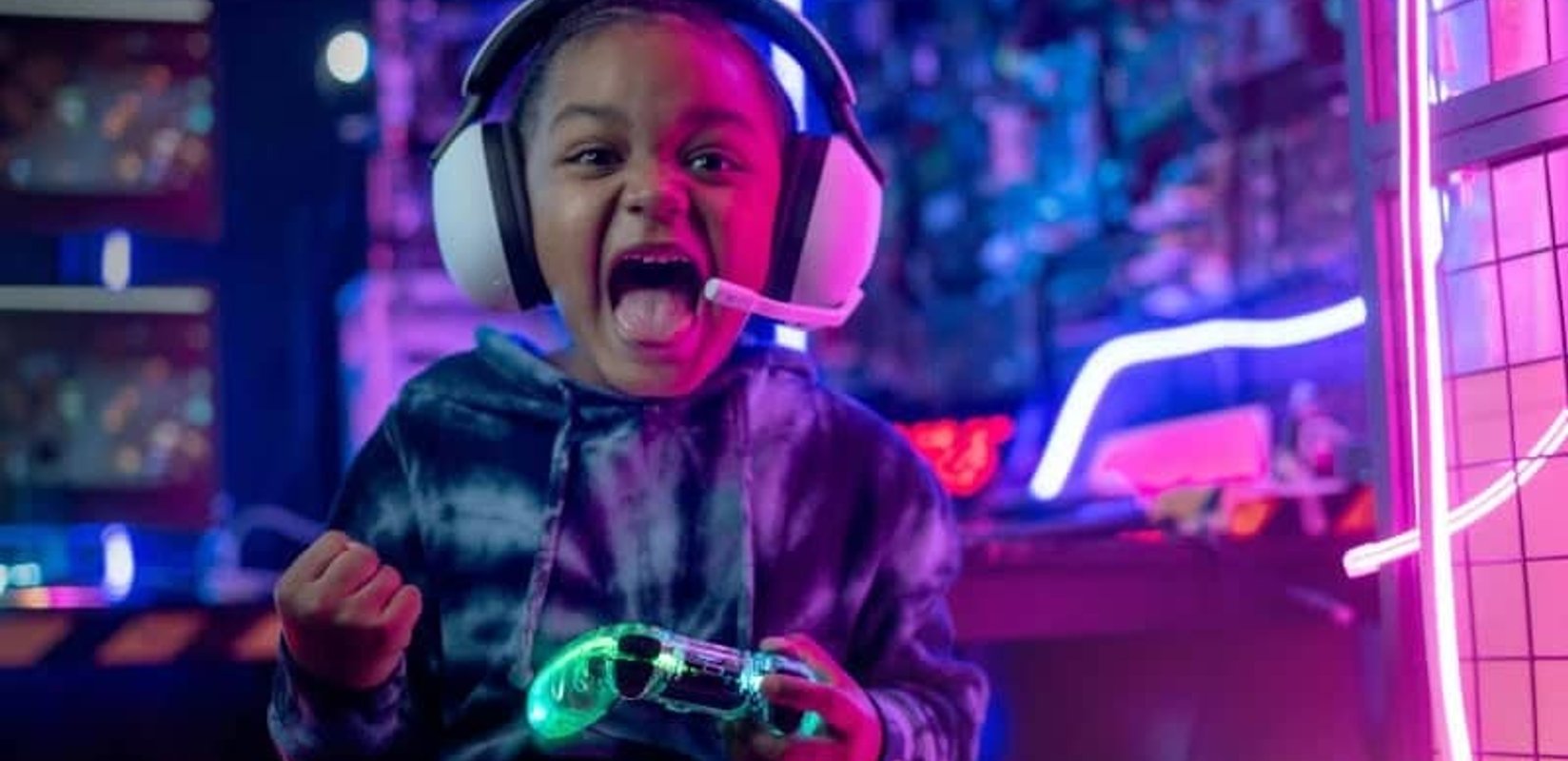 Fortnite-themed birthday party setup with gaming screens