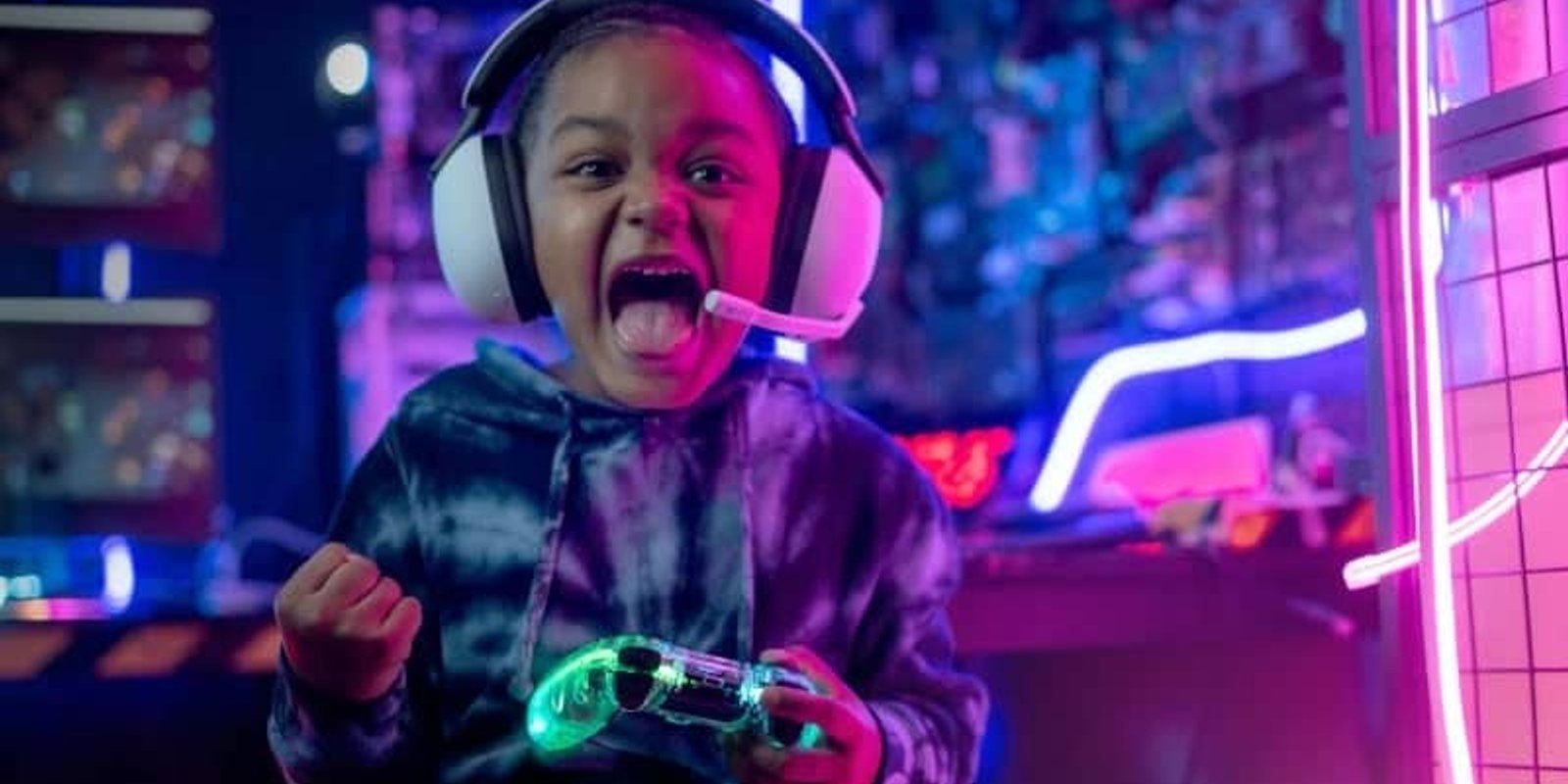Fortnite-themed birthday party setup with gaming screens